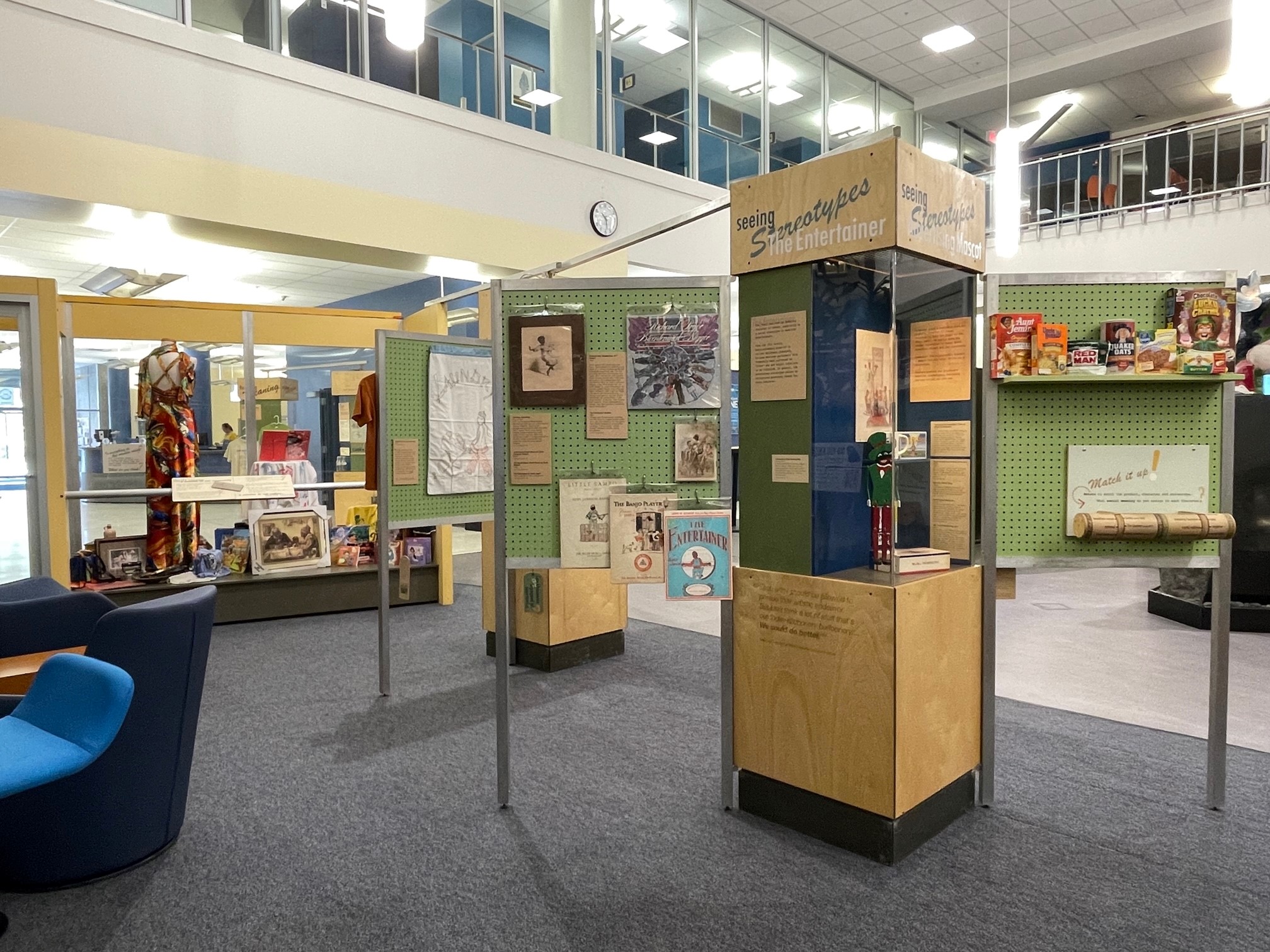 The MSU Library "Sorting Out Race" exhibit shows items displayed in cases that were donated to thrift stores that displayed racial imagery and harmful stereotypes.