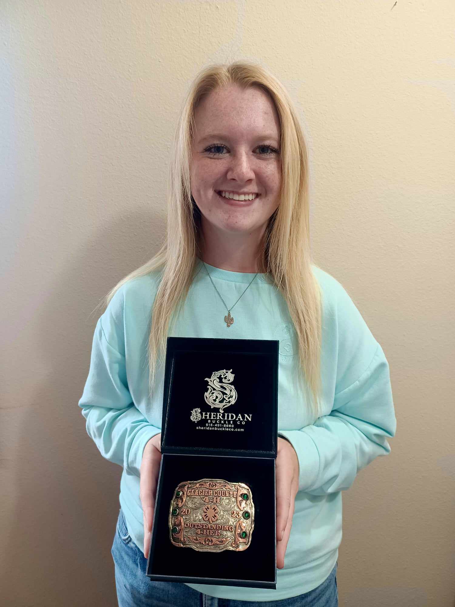 Addisyn Bengtson was named the Glacier County 4-H Outstanding Member for 22 – 23, receiving a custom belt buckle and having her name engraved on a plaque in the Extension Office.