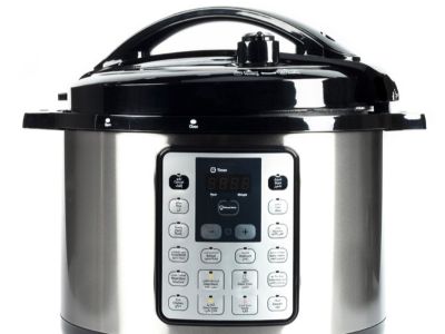Pressure Cooker feature image an example of a pressure cooker with a digital display and buttons, a handle that spans the lid, and a release valve.