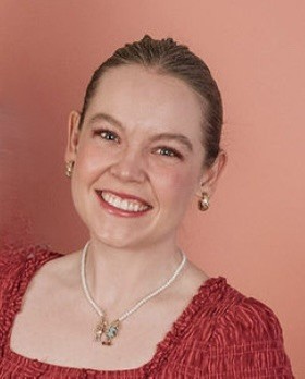 Staff member, Devon, smiling for portrait